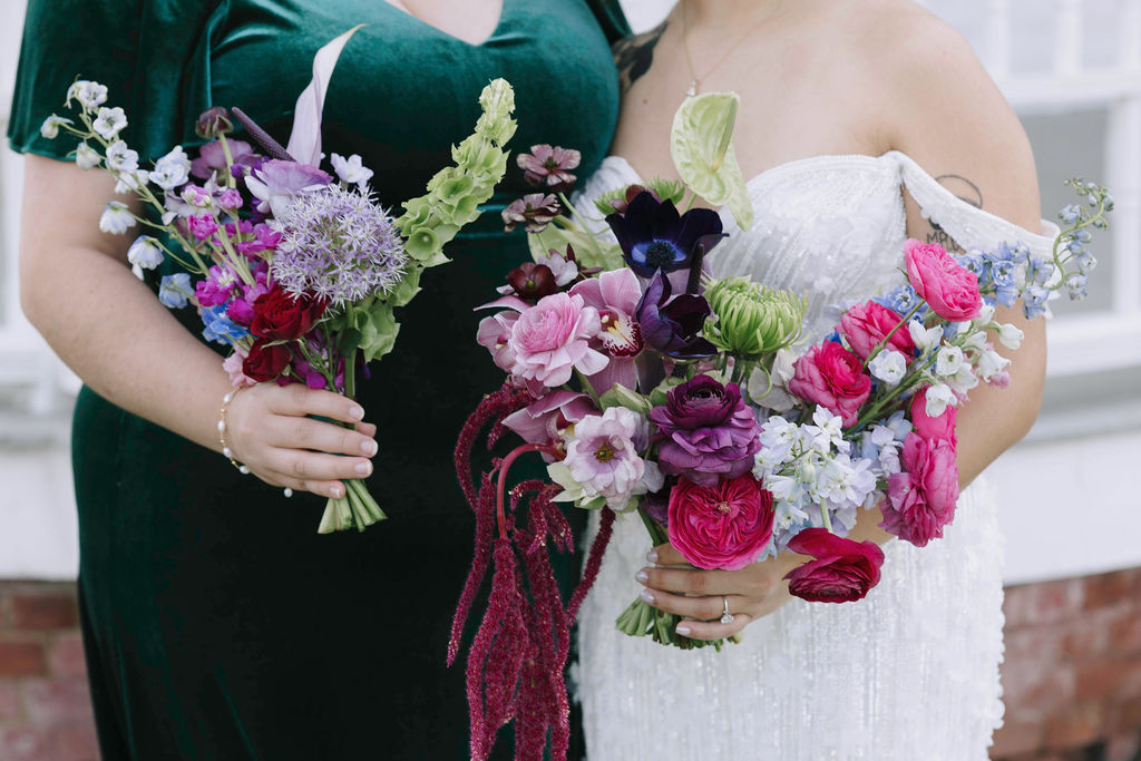 Textured colorful wedding bouquet with amaranthus, anthurium, ranunculus and roses