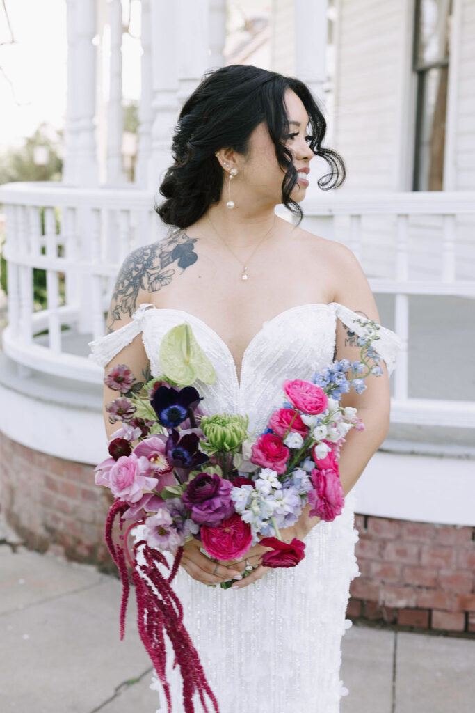 Ethereal textures and radiant colors inspired by the Northern Lights. amaranthus, anthurium, ranunculus, roses jewel tone, purple pink green